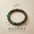 Wood and gemstone feng shui bracelet for wealth wisdom and protection